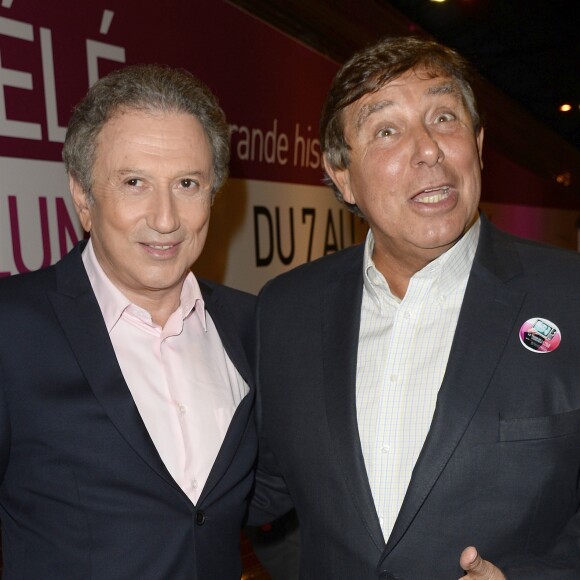 Michel Drucker et Jean-Pierre Foucault - Inauguration "Le Train de la Télé" à Paris Gare de Lyon le 6 octobre 2014.