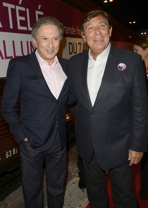 Michel Drucker et Jean-Pierre Foucault - Inauguration "Le Train de la Télé" à Paris Gare de Lyon le 6 octobre 2014.