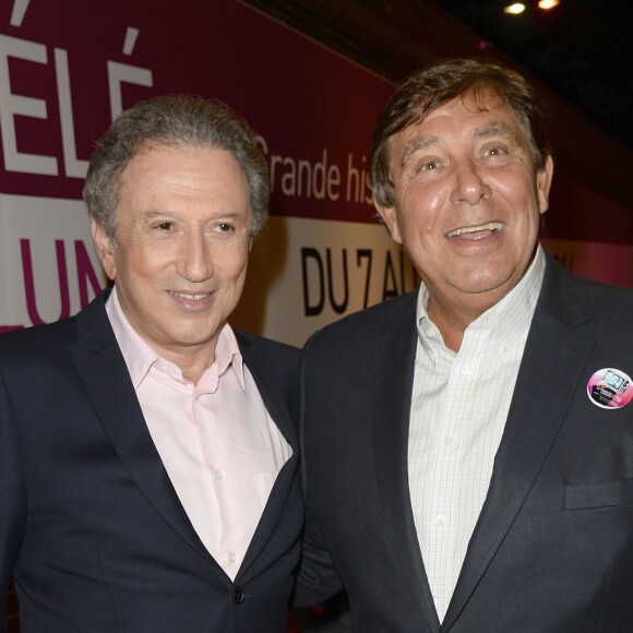 Michel Drucker et Jean-Pierre Foucault - Inauguration "Le Train de la Télé" à Paris Gare de Lyon le 6 octobre 2014.