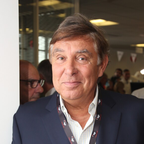Charity Day BGC 2014 - Jean-Pierre Foucault - Courtier d'un jour pour encourager les clients à passer ce jour là le maximum d'ordres dans la salle des marchés d'Aurel BGC Rue Vivienne à Paris. Le 11 septembre 2014