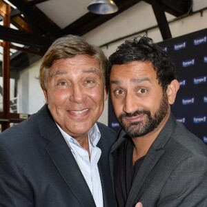 Jean-Pierre Foucault et Cyril Hanouna - Conférence de rentrée de Europe 1 à Paris. Le 3 septembre 2014