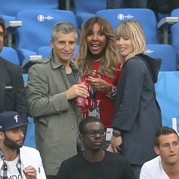 Cathy Guetta, Nagui et sa femme Mélanie Page lors du match du quart de finale de l'UEFA Euro 2016 France-Islande au Stade de France à Saint-Denis, France le 3 juillet 2016. © Cyril Moreau/Bestimage