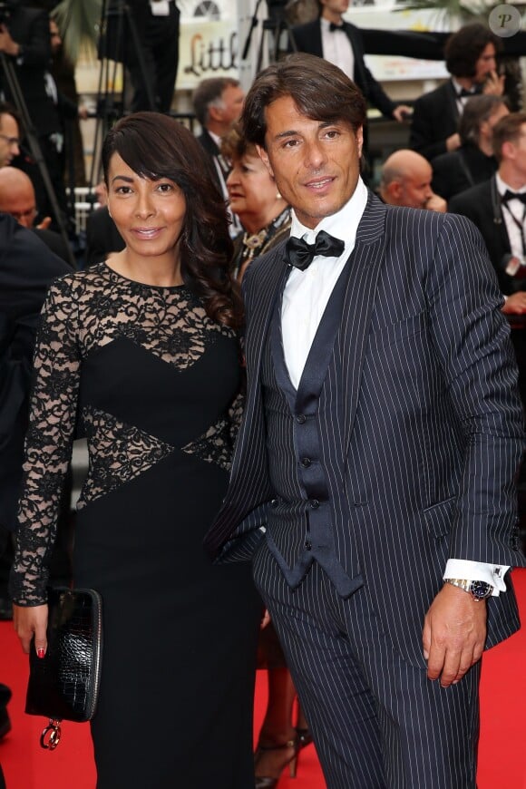 Giuseppe et sa compagne Hinda, dans une robe Paule Ka, arrivent au Palais des Festivals pour le film Jimmy's Hall lors du 67e Festival de Cannes, le 22 mai 2014