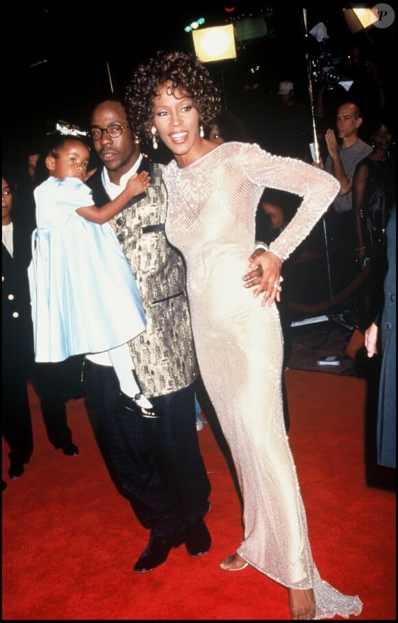 Whitney Houston et son mari Bobbi Kristina et leur fills Bobbi Kristina Brown à la première de Cinderella, le 22 octobre 1997