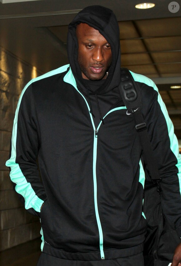 Lamar Odom arrive a l'aeroport LAX de Los Angeles le 27 novembre 2013