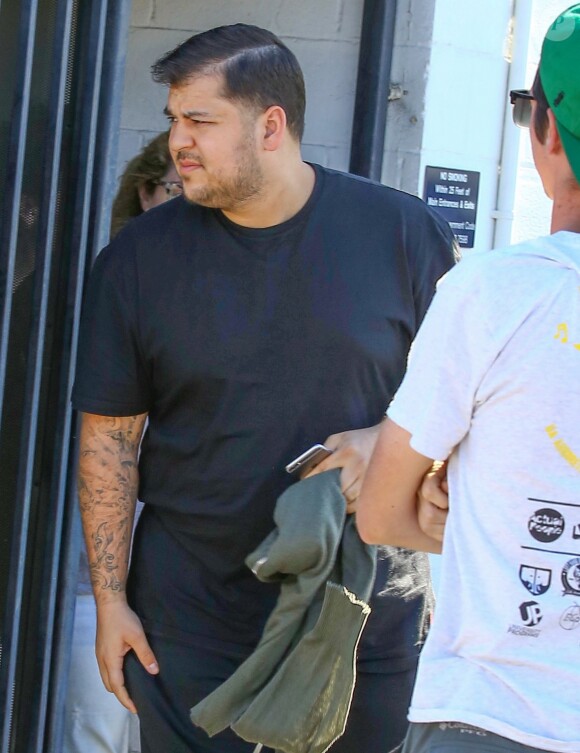 Exclusif - Blac Chyna enceinte et son fiancé Rob Kardashian à la sortie d'un studio d’enregistrement à Los Angeles, le 7 juillet 2016 For germany call for price Exclusive - Pregnant model Blac Chyna and her fiance Rob Kardashian spotted heading to a studio while they film 'Keeping Up With The Kardashians' in Los Angeles, California on July 7, 2016.07/07/2016 - Los Angeles