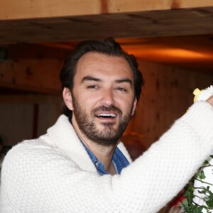 Cyril Lignac a confectionné un gâteau a l'occasion de la presentation du film "L'ile des Miam-nimaux : Tempête de boulettes gééantes 2" lors du 17e Festival International du Film de Comedie de l'Alpe d'Huez, a l'Alpe d'Huez, le 17 janvier 2014.