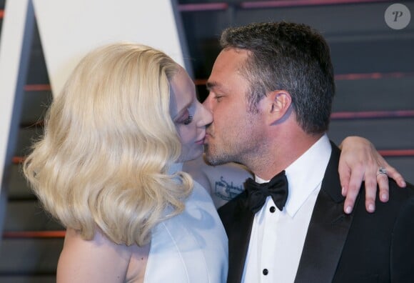Lady Gaga et son compagnon Taylor Kinney - People à la soirée "Vanity Fair Oscar Party" après la 88e cérémonie des Oscars à Beverly Hills, le 28 février 2016