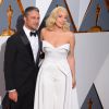 Taylor Kinney et sa compagne Lady Gaga - Photocall de la 88e cérémonie des Oscars au Dolby Theatre à Hollywood. Le 28 février 2016