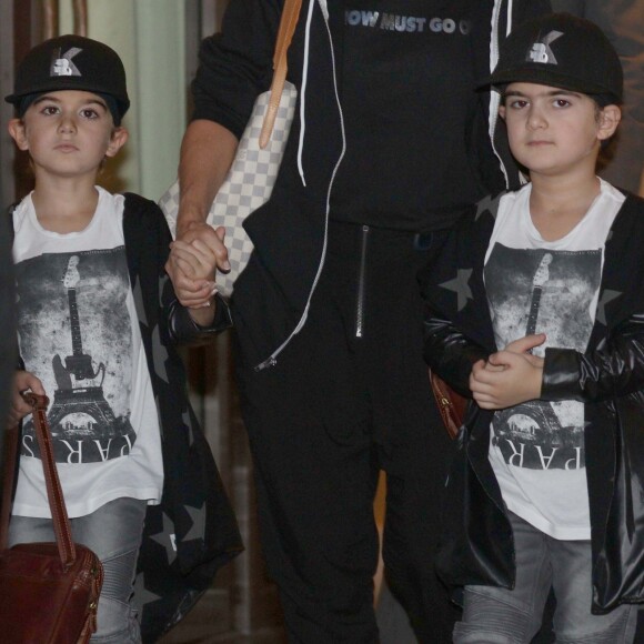 Nelson et Eddy, les jumeaux de Céline Dion quittent l'hôtel Royal Monceau à Paris le 9 juillet 2016.