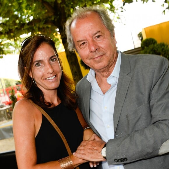 Christian Morin et sa femme lors de l'arrivée du Tour de France 2016 sur les Champs-Élysées à Paris le 24 juillet 2016. © Coadic Guirec / Bestimage
