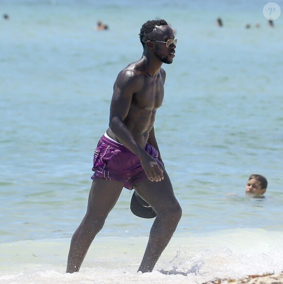 Bacary Sagna, sa femme Ludivine et leurs fils Kais et Elias sur une plage à Miami Le 23 Juillet 2016  Please Hide Children's Face Prior To The Publication 52131333 Soccer player Bacary Sagna and his wife Ludvine Sagna hit the beach with their two kids Kais and Elias in Miami, Florida on July 23, 2016. The group enjoyed swimming in the ocean.23/07/2016 - Miami