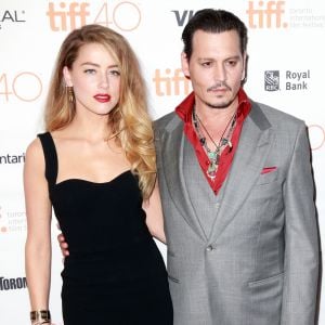 Amber Heard et son mari Johnny Depp lors de l'Avant-première du film "Black Mass" lors du Festival International du film de Toronto, le 14 septembre 2015.