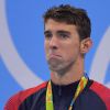 Michael Phelps en larmes après avoir gagné sa 22e médaille d'or à Rio de Janeiro, le 11 août 2016.