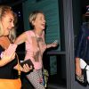 Sharon Stone et guest - Les célébrités arrivent au concert de Adele au Staples Center à Los Angeles, le 9 août 2016