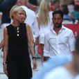 Semi-exclu - Cyril Kamar (Alias K.Maro) et sa femme Anne-Sophie Mignaux recemment mariés se promènent avec des amis dans les rues de Saint-Tropez le 27 juillet 2016.