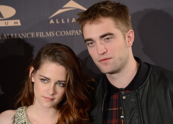 Kristen Stewart et Robert Pattinson - Photocall du film "Twilight Saga: Breaking Dawn" à Madrid. Le 15 novembre 2012