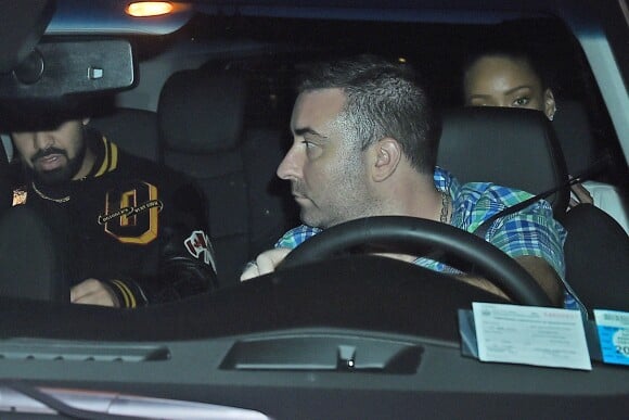 Drake and Rihanna hide in the backseat of a limo after a romantic dinner date at Nobu in New York City, NY, USA. The on-again couple held, what appeared to be glasses of wine, as they drove off from the restaurant. Photo by GSI/ABACAPRESS.COM30/08/2016 - New York City