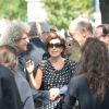 Elie Chouraqui et Ruth Elkrief lors des obsèques de Sonia Rykiel au cimetière de Montparnasse à Paris, le 1er septembre 2016.