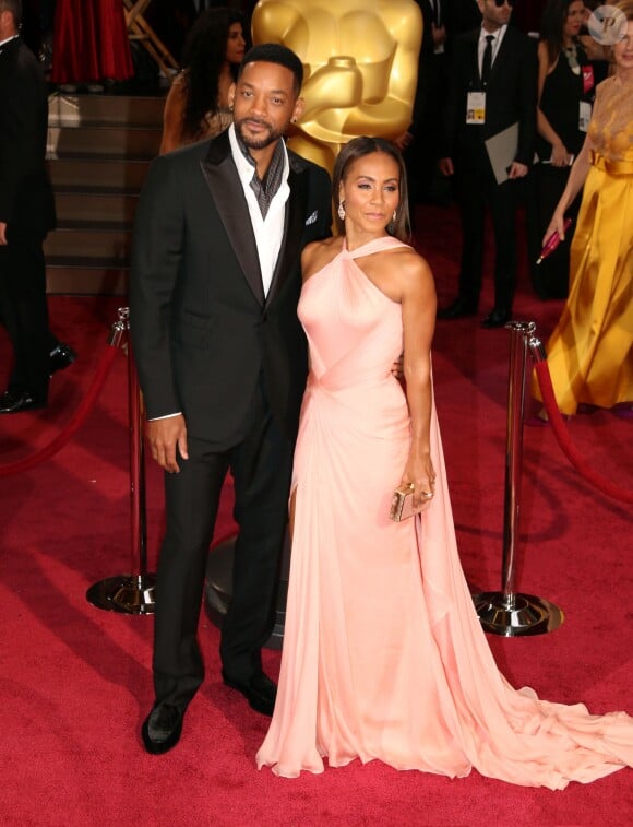 Will Smith et sa femme Jada Pinkett Smith à la 86ème cérémonie des Oscars à Hollywood, le 2 mars 2014.