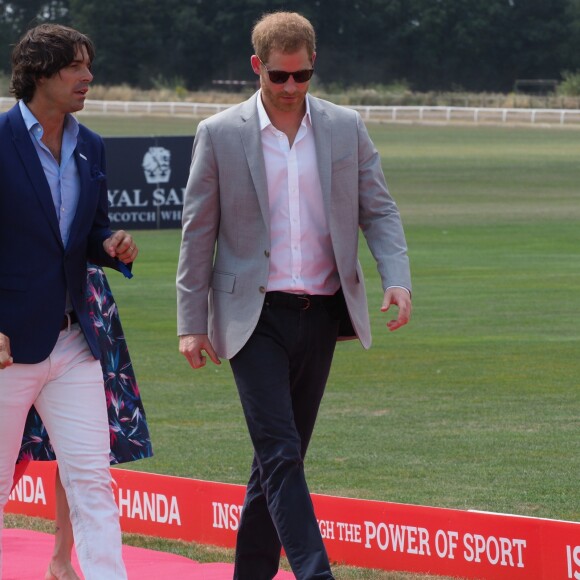 Le prince Harry, duc de Sussex et Meghan Markle, la Duchesse de Sussex arrivent à la Royal Berkshire Polo Cup où le Duc participe aujourd'hui à la Coupe ISP Hanz de Sentebale à Windsor au Royaume-Uni, le 26 juillet 2018.  The Duke of Sussex and Duchess of Sussex arrive at the Royal Berkshire Polo Cup where the Duke is taking part in the Sentebale ISPS Handa Polo Cup today.26/07/2018 - Windsor
