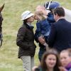 La princesse Anne avec son gendre Mike Tindall et sa petite-fille Mia Tindall le 19 juin 2016 au Beaufort Polo Club à Tetbury.