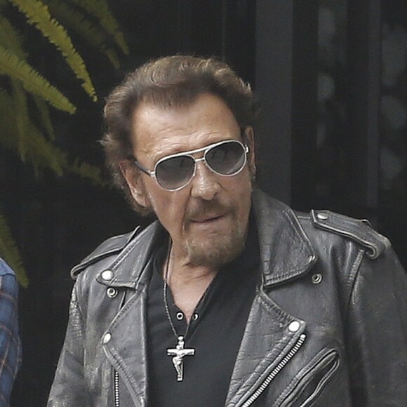 Exclusif - Johnny Hallyday quitte sa propriété de Pacific Palissades le 12 septembre 2016 pour aller faire une virée à moto et faire "Easy Rider" à l'envers. Ils prendront la route depuis La Nouvelle-Orléans jusqu'à Los Angeles le 14 septembre 2016.