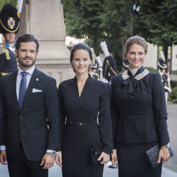 La princesse Madeleine de Suède, le prince Carl Philip et la princesse Sofia le 13 septembre 2016 à la cérémonie d'inauguration du Parlement pour l'exercice 2016-2017, au Riksdagshuset à Stockholm.