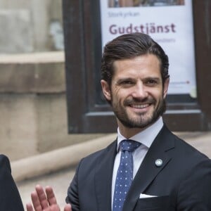 La princesse Madeleine de Suède, le prince Carl Philip et la princesse Sofia le 13 septembre 2016 à la cérémonie d'inauguration du Parlement pour l'exercice 2016-2017, au Riksdagshuset à Stockholm.