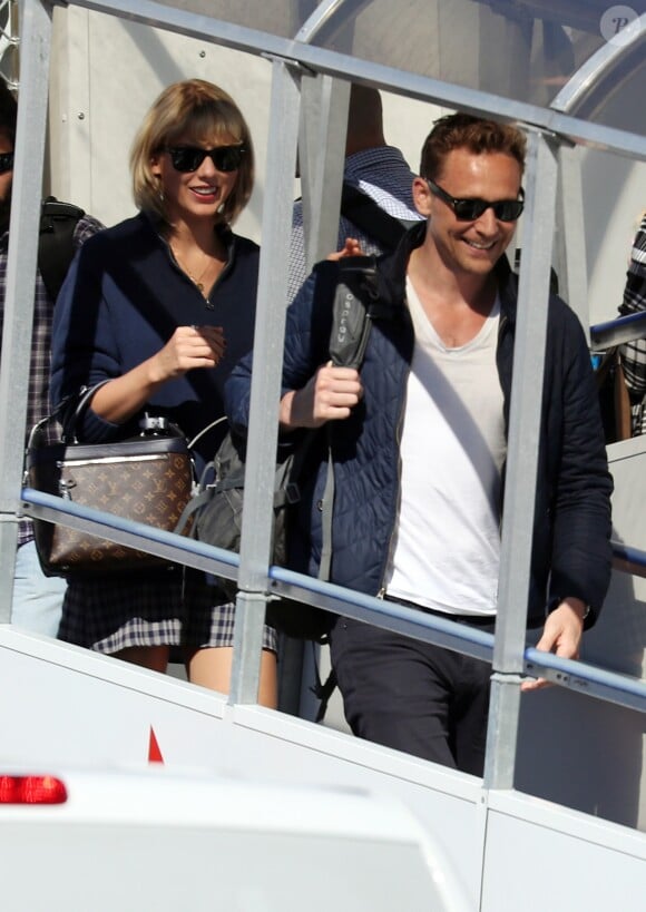 Taylor Swift et Tom Hiddleston arrivent à l'aéroport de Sydney, Australie, le 8 juillet 2016.
