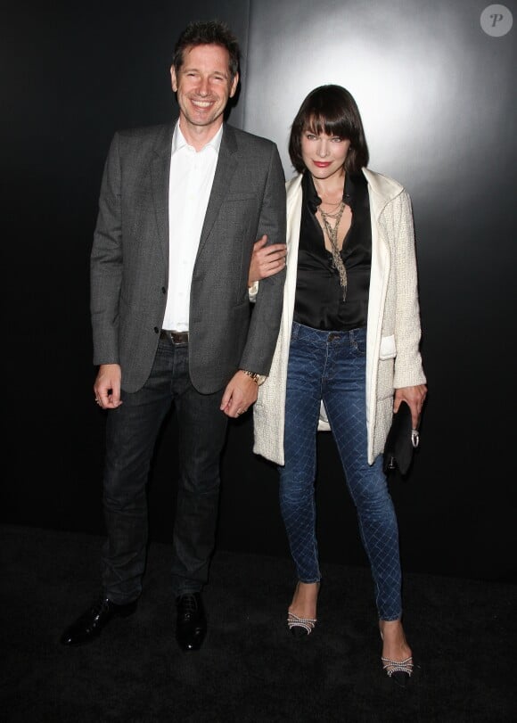 Milla Jovovich et son mari Paul William Scott Anderson à la soirée Chanel en l'honneur du nouveau parfum N°5 L'Eau au Sunset Tower Hotel. Los Angeles, le 22 septembre 2016.
