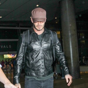 David Beckham arrive à l'aéroport Lax de Los Angeles le 24 juillet 2016.