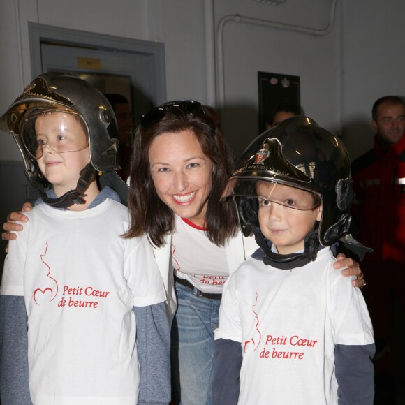 Exclusif - Natasha St-Pier, son mari Grégory Quillacq et leur fils Bixente soutiennent l'association "Petit Coeur de Beurre" lors du week-end de la Cardiopathie Congénitale à la caserne des pompiers de Malar, dans le 7e arrondissement de Paris, le 1er octobre 2016.