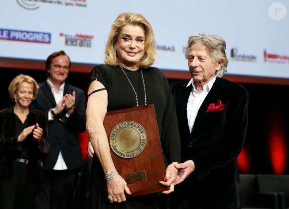 Catherine Deneuve et Roman Polanski lors de la remise du Prix Lumière 2016 à Catherine Deneuve durant le 8ème Festival Lumière à Lyon, le 14 octobre 2016