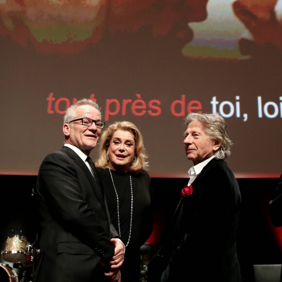 Thierry Fremaux, Catherine Deneuve et Roman Polanski lors de la remise du Prix Lumière 2016 à Catherine Deneuve durant le 8ème Festival Lumière à Lyon, le 14 octobre 2016