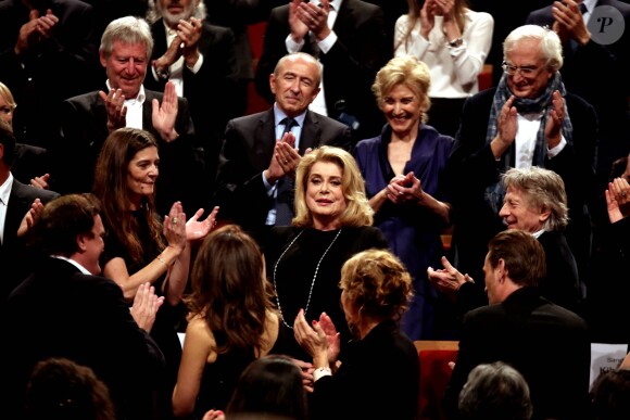 Régis Wargnier, Quentin Tarantino, Daniela Pick, Gérard Collomb, Chiara Mastroianni, Catherine Deneuve, Marisa Parades, Roman Polanski et Bertrand Tavernier lors de la remise du Prix Lumière 2016 à Catherine Deneuve durant le 8ème Festival Lumière à Lyon, le 14 octobre 2016