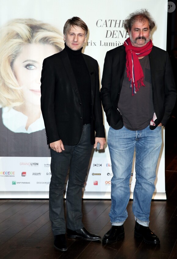 Stanislas Merhar et Gustave Kervern devant le photocall de la cérémonie du Prix Lumière lors du 8ème Festival Lumière à Lyon, le 14 octobre 2016