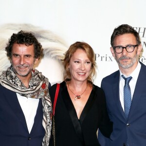 Eric Lartigau, Emmanuelle Bercot et Michel Hazanavicius devant le photocall de la cérémonie du Prix Lumière lors du 8ème Festival Lumière à Lyon, le 14 octobre 2016