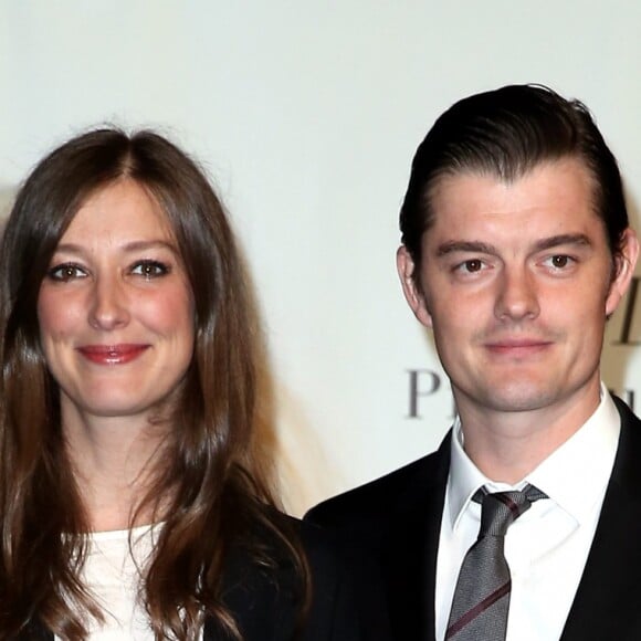 Sam Riley et sa femme Alexandra Maria Lara devant le photocall de la cérémonie du Prix Lumière lors du 8ème Festival Lumière à Lyon, le 14 octobre 2016