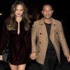 John Legend et sa femme Chrissy Teigen arrivent à leur hôtel à Londres, le 23 octobre 2016, après s'être rendus sur le plateau de "X-Factor.