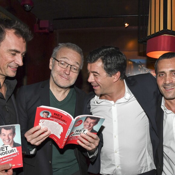 Stéphane Plaza pose avec Arnaud Gidoin, Laurent Ruquier et David Setrouk pour le lancement de son livre "Net Vendeur" (éditions Cherche Midi) au Buddha Bar à Paris, France, le 9 novembre 2016.