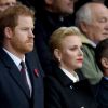 Le prince Harry, la princesse Charlène de Monaco et son frère Gareth Wittstock assistent au match de rugby Angleterre - Afrique du Sud, dans le cadre de la tournée d'automne 2016 au Twickenham Stadium à Londres, le 12 novembre 2016. L'Angleterre a remporté le match (37-21).