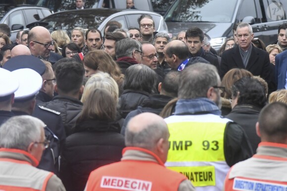 Didier Paillard, maire de Saint-Denis, François Hollande, président de la République, François Molins, procureur de la République de Paris lors de l'hommage aux victimes des attentats du 13 novembre 2015 devant le Stade de France à Saint-Denis, le 13 novembre 2016.