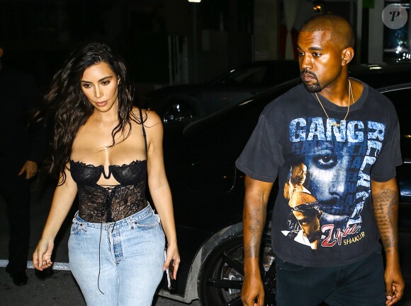 Kim Kardashian et son mari Kanye West à la sortie de leur hôtel à Miami, le 15 septembre 2016.
