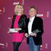 33 ans d'écart : Emmanuelle Seigner (Meilleure Actrice) et son mari Roman Polanski (Meilleur Réalisateur) lors du déjeuner des nommés aux César au restaurant Fouquet's à Paris, le 8 février 2014.