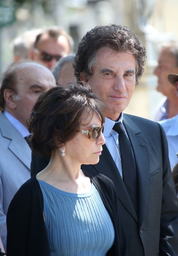 Jack Lang et sa femme Monique - Obsèques de Valérie Lang au cimetière du Père Lachaise à Paris. Le 25 juillet 2013