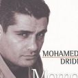 Couverture de "Momo le turbulent", l'autobiographie de Mohamed Dridi sorti le 17 juin 2004 aux éditions Michel Lafon.