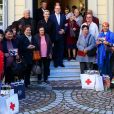 Exclusif - Le prince Albert II de Monaco et la princesse Charlene participent à la remise des cadeaux aux anciens monégasques dans les locaux de la Croix Rouge à Monaco le 16 décembre 2016.