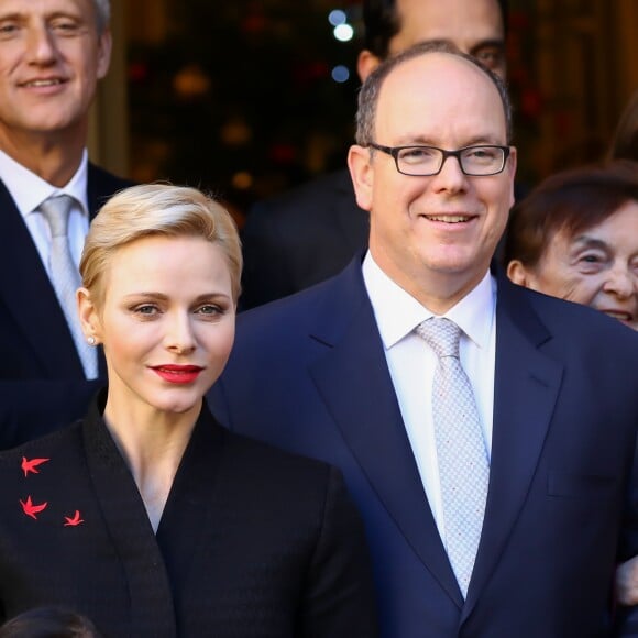 Exclusif - Le prince Albert II de Monaco et la princesse Charlene participent à la remise des cadeaux aux anciens monégasques dans les locaux de la Croix Rouge à Monaco le 16 décembre 2016.