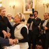 Exclusif - Le prince Albert II de Monaco et la princesse Charlene participent à la remise des cadeaux aux anciens monégasques dans les locaux de la Croix Rouge à Monaco le 16 décembre 2016.